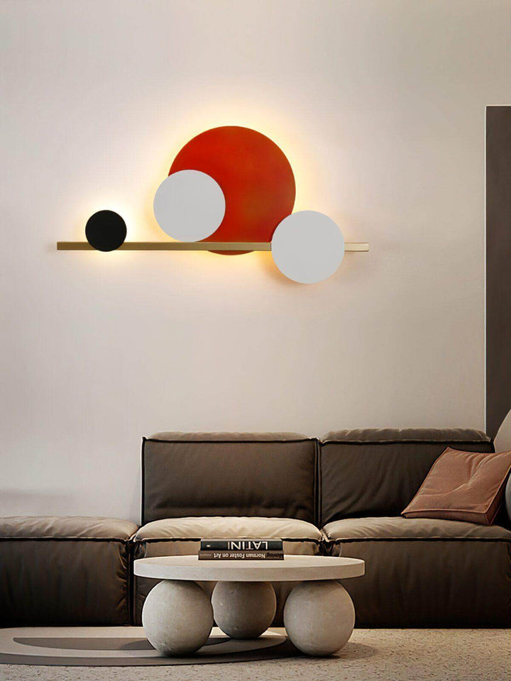 Modern circle LED wall light in stylish living room, perfect for accent wall lighting and bedroom wall sconces.