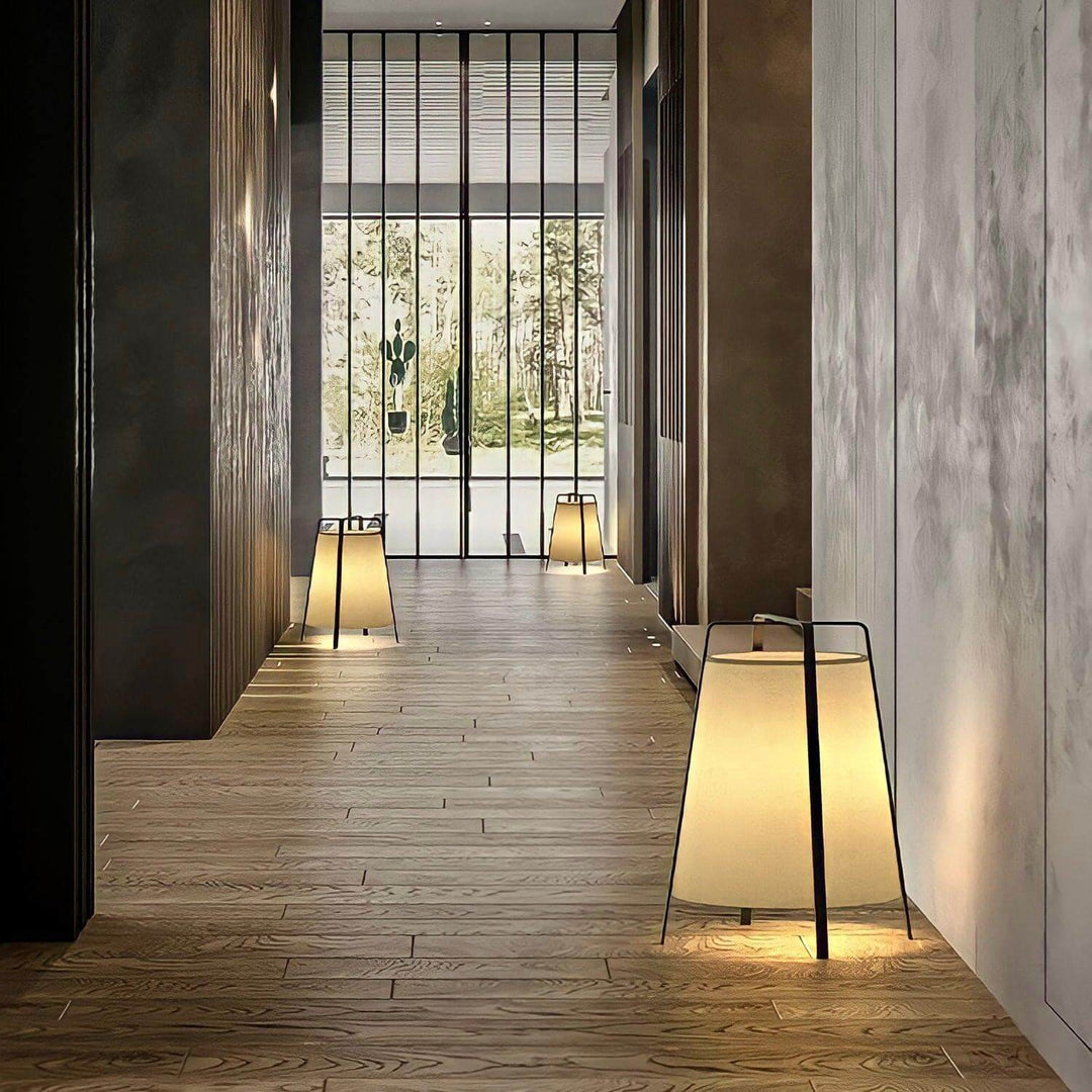 Modern hallway featuring unique vintage table lamps, enhancing the ambiance with warm lighting.