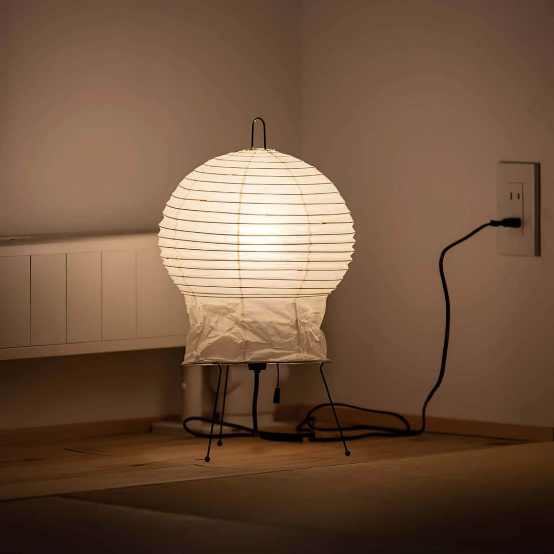 Akari 2N Table Lamp featuring a white, round design, perfectly blending Japandi and Art Deco styles for elegant accent lighting.
