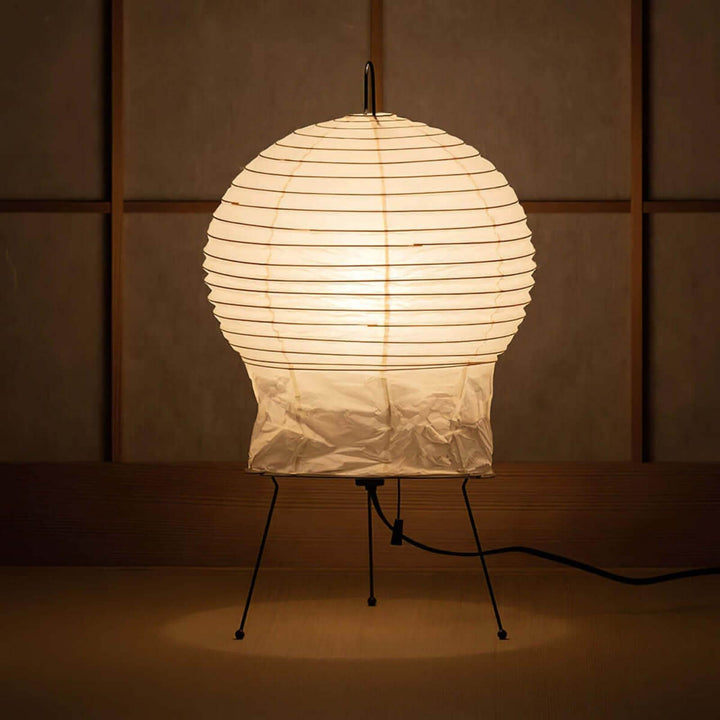 Akari 2N Table Lamp showcasing a modern Japandi design with a white spherical shade, perfect as an accent lamp in any decor.