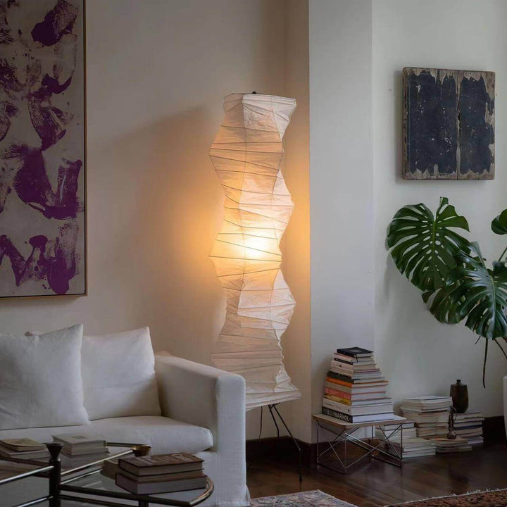 Akari UF4-33N white rice paper minimalist floor lamp, 185cm tall, illuminating modern living room decor.