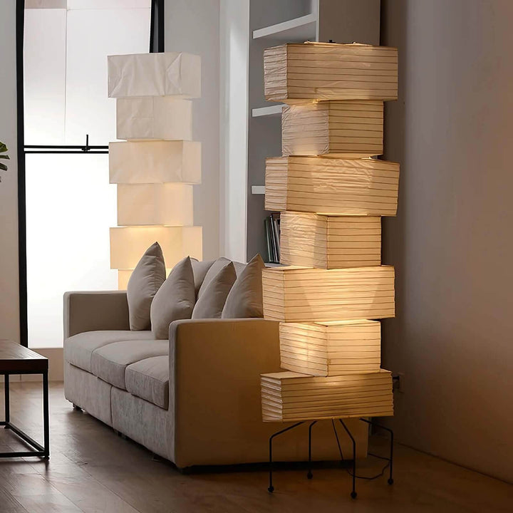 Elegant Akari UF4-L10 white rice paper floor lamp, a minimalist lantern design perfect for modern interiors.