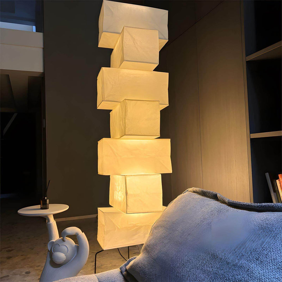 Akari UF4-L10 white rice paper floor lamp in minimalist design, perfect for modern interiors.