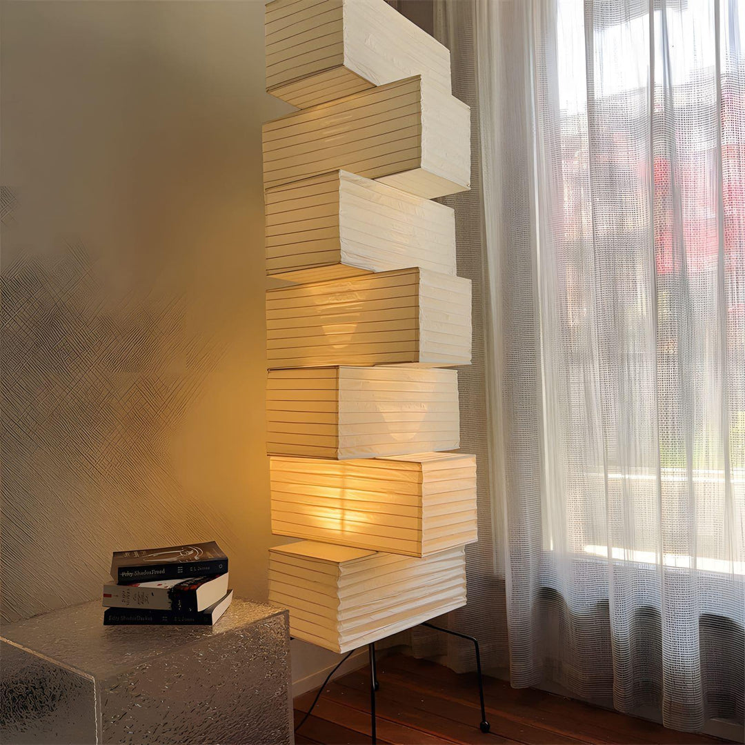 Akari UF4-L10 white floor lamp, rice paper design, minimalist Japanese style, lantern-style illumination in modern interior.
