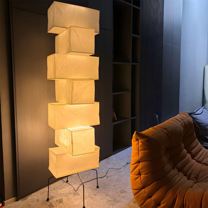 Akari UF4-L10 white rice paper minimalist floor lamp in modern interior, featuring a stacked lantern design.