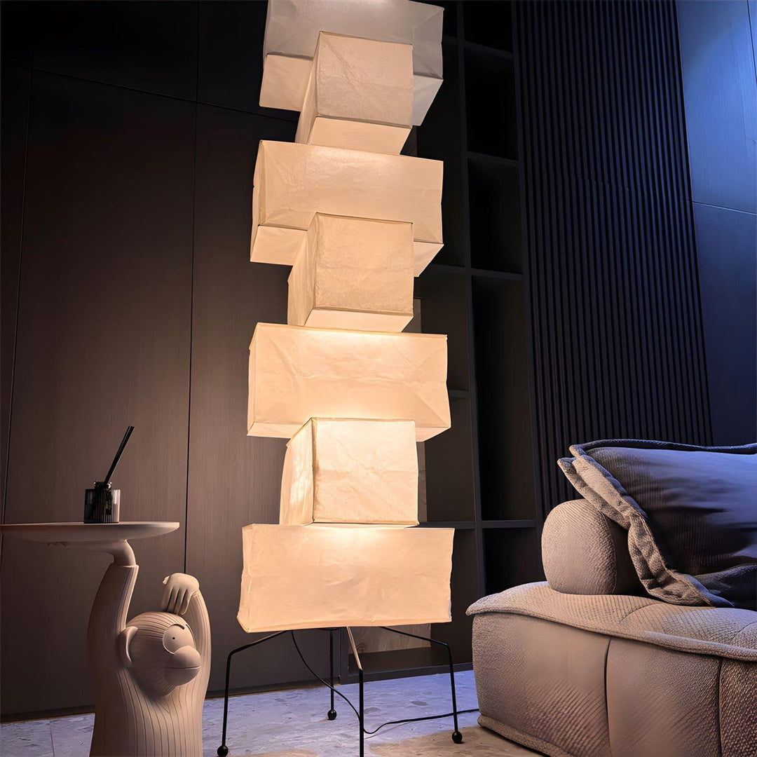 Akari UF4-L10 white rice paper floor lamp, minimalist Japanese lantern design in modern living room setting.