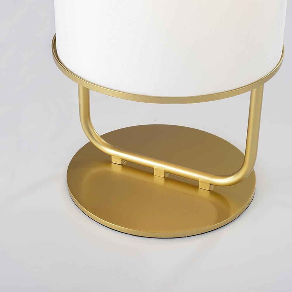 Stylish Alistair table lamp featuring a gold base and white shade, perfect for bedside or as a decorative Japandi light.