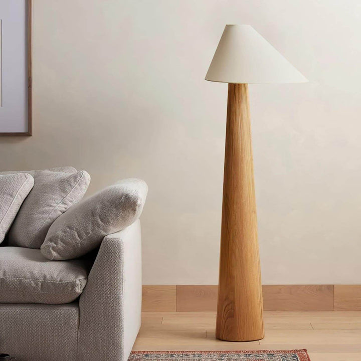 Alvin Floor Lamp standing in a room, showcasing its wooden design and retro farmhouse style.