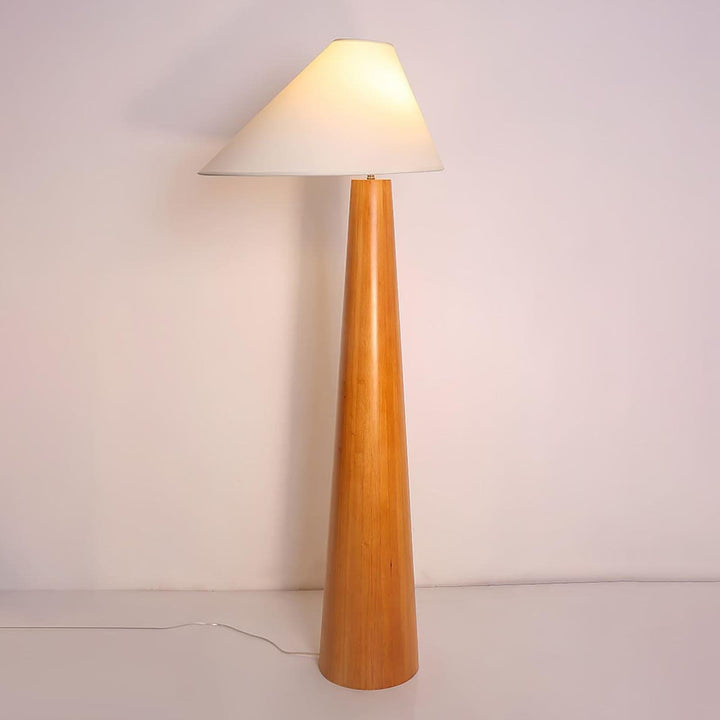 Alvin wooden floor lamp with retro design, featuring a conical wooden base and a conical white lampshade.