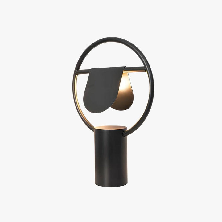 Modern Anae table lamp featuring art deco design, round shape, and black finish, perfect for bedside lighting.