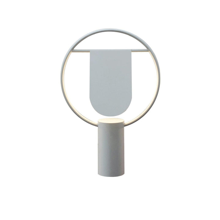 Modern white table lamp with circular design and cylindrical base, ideal for contemporary home decor.