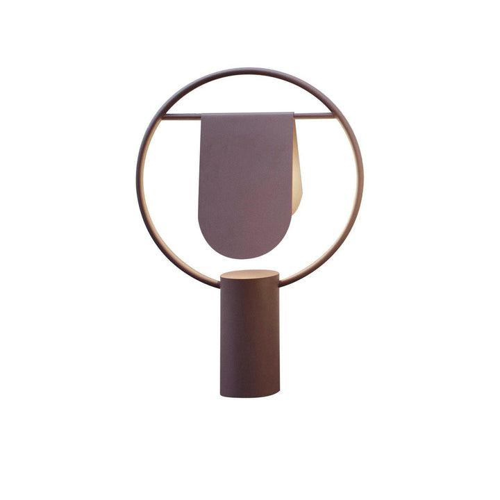 Modern art deco table lamp featuring a circular design with a cylindrical base, perfect for stylish bedroom lighting.