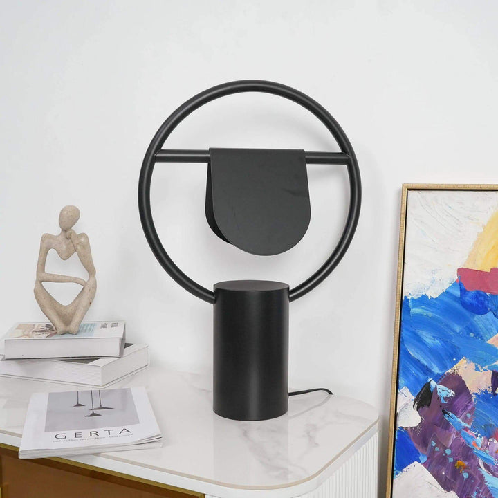 Modern Anae table lamp with art deco design, black finish, perfect for bedside or bedroom decor.