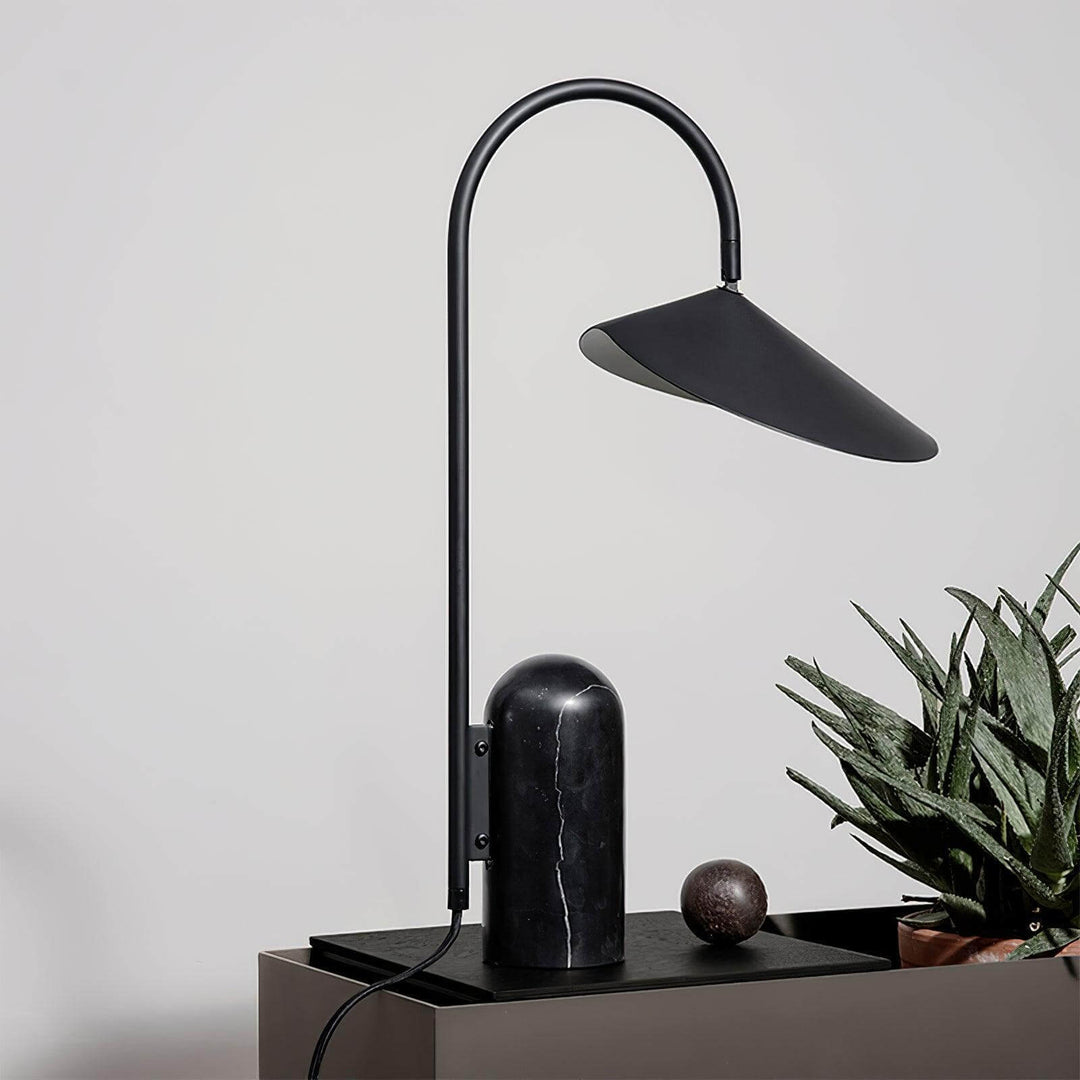 Stylish Arum marble table lamp in black, perfect for office and modern living room decor.