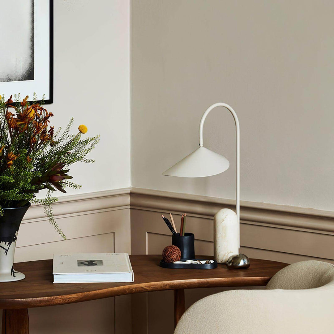 Stylish Arum Table Lamp on a wood table, perfect as a modern marble table lamp for office or living room decor.