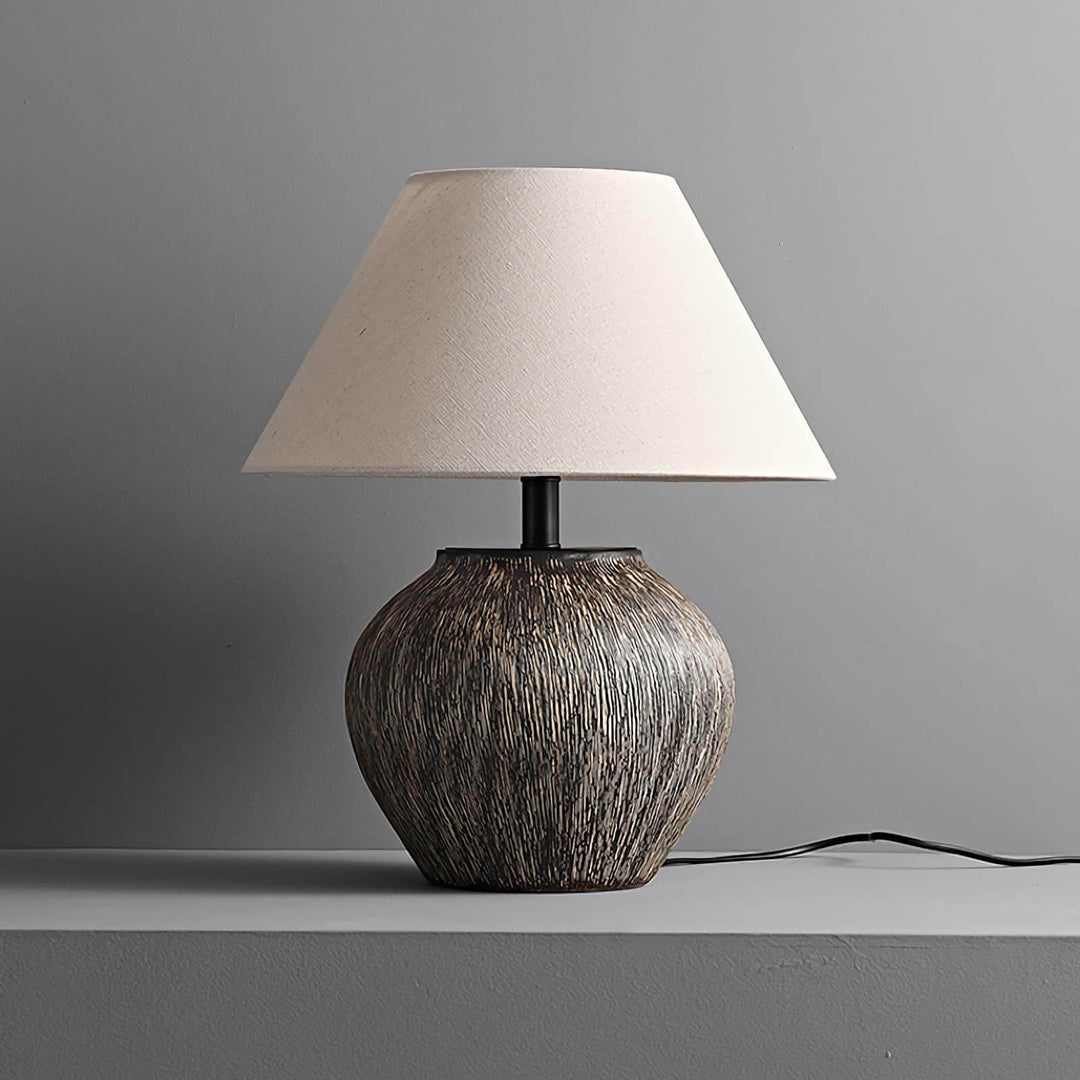 Bayi ceramic table lamp with vintage design, featuring a textured base and fabric shade, perfect for sofa tables.