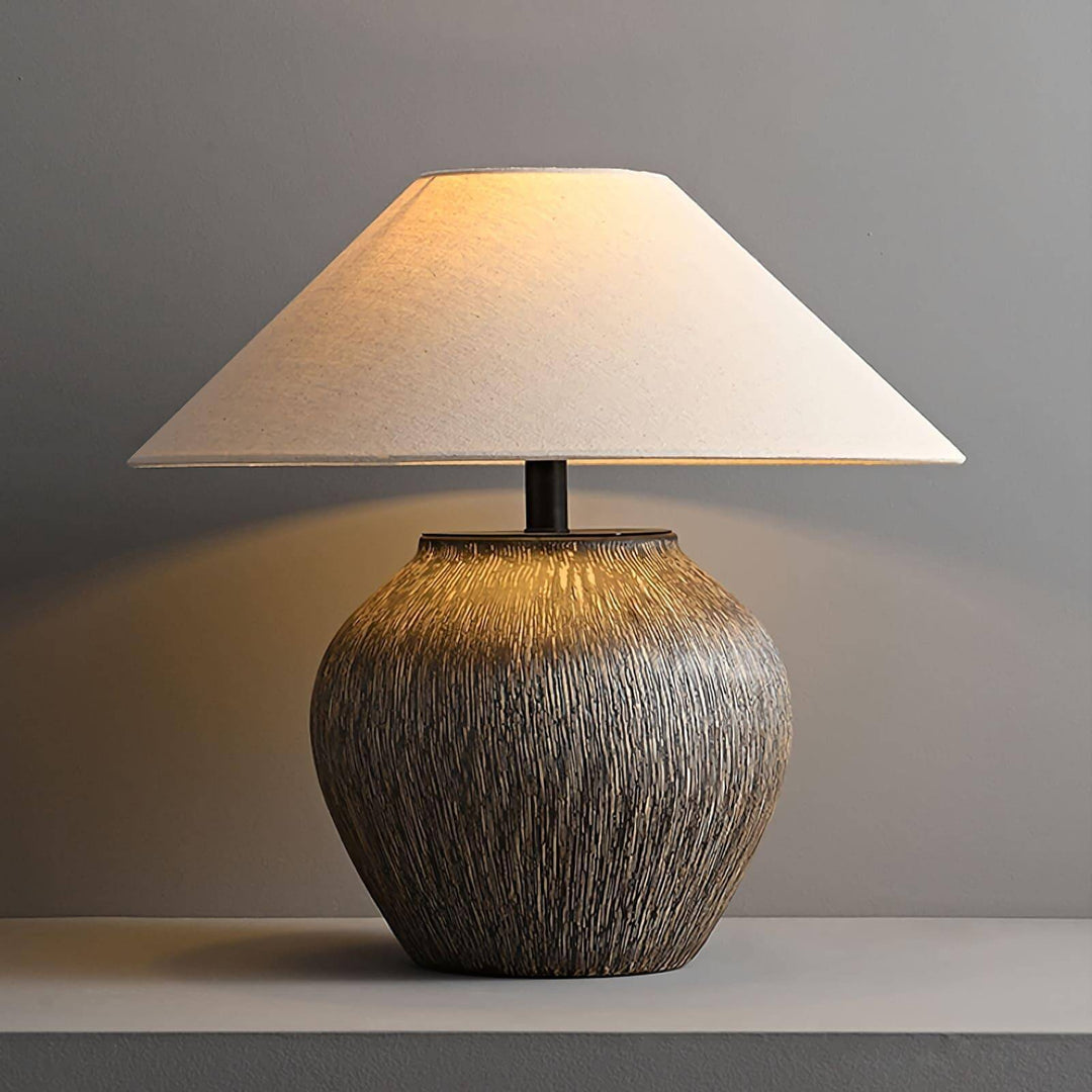 Bayi ceramic table lamp with a textured base and soft shade, perfect for vintage or sofa table decor.