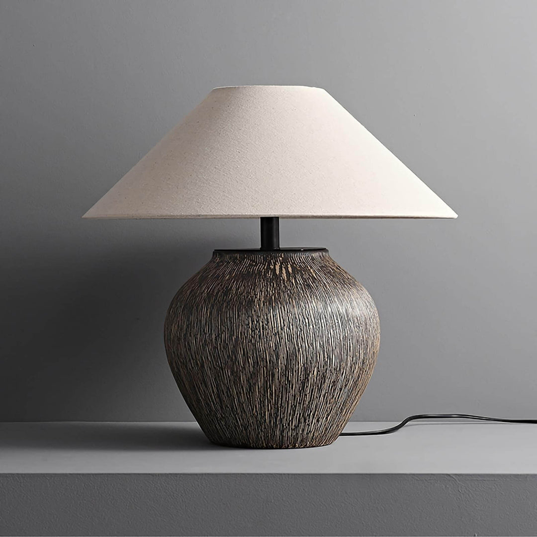 Bayi ceramic table lamp with a textured base and cream shade, perfect for vintage sofa table lighting.