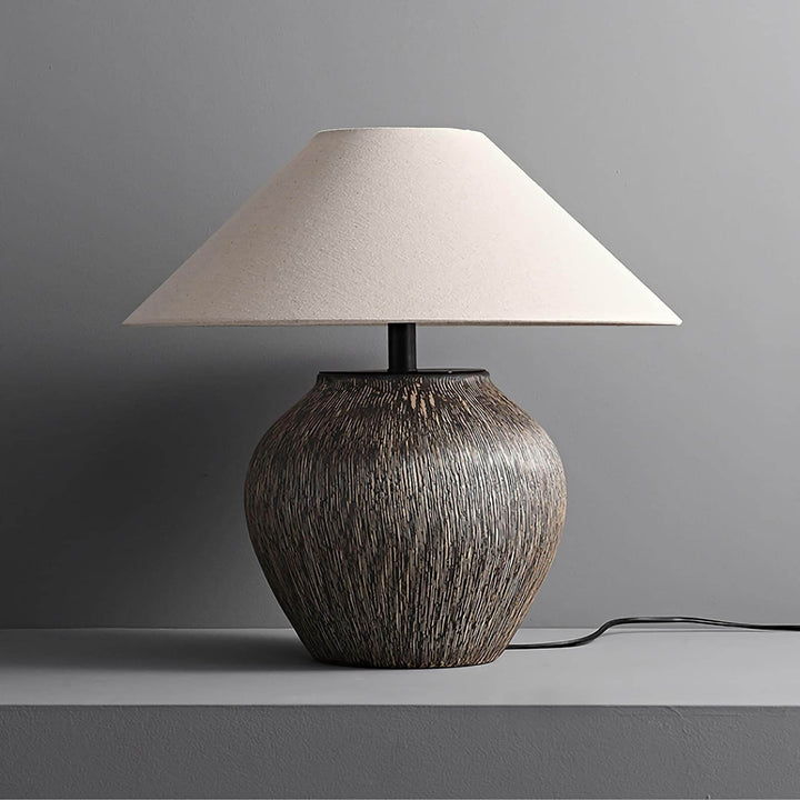 Bayi ceramic table lamp with a textured base and cream shade, perfect for vintage sofa table lighting.