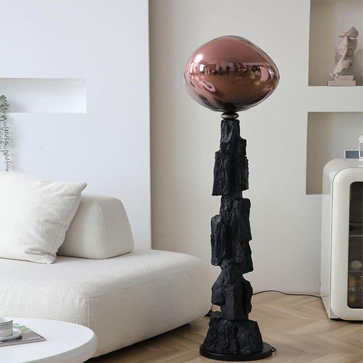 Unique charcoal lava floor lamp with art deco design, featuring unusual sculptural base and stylish metallic shade.