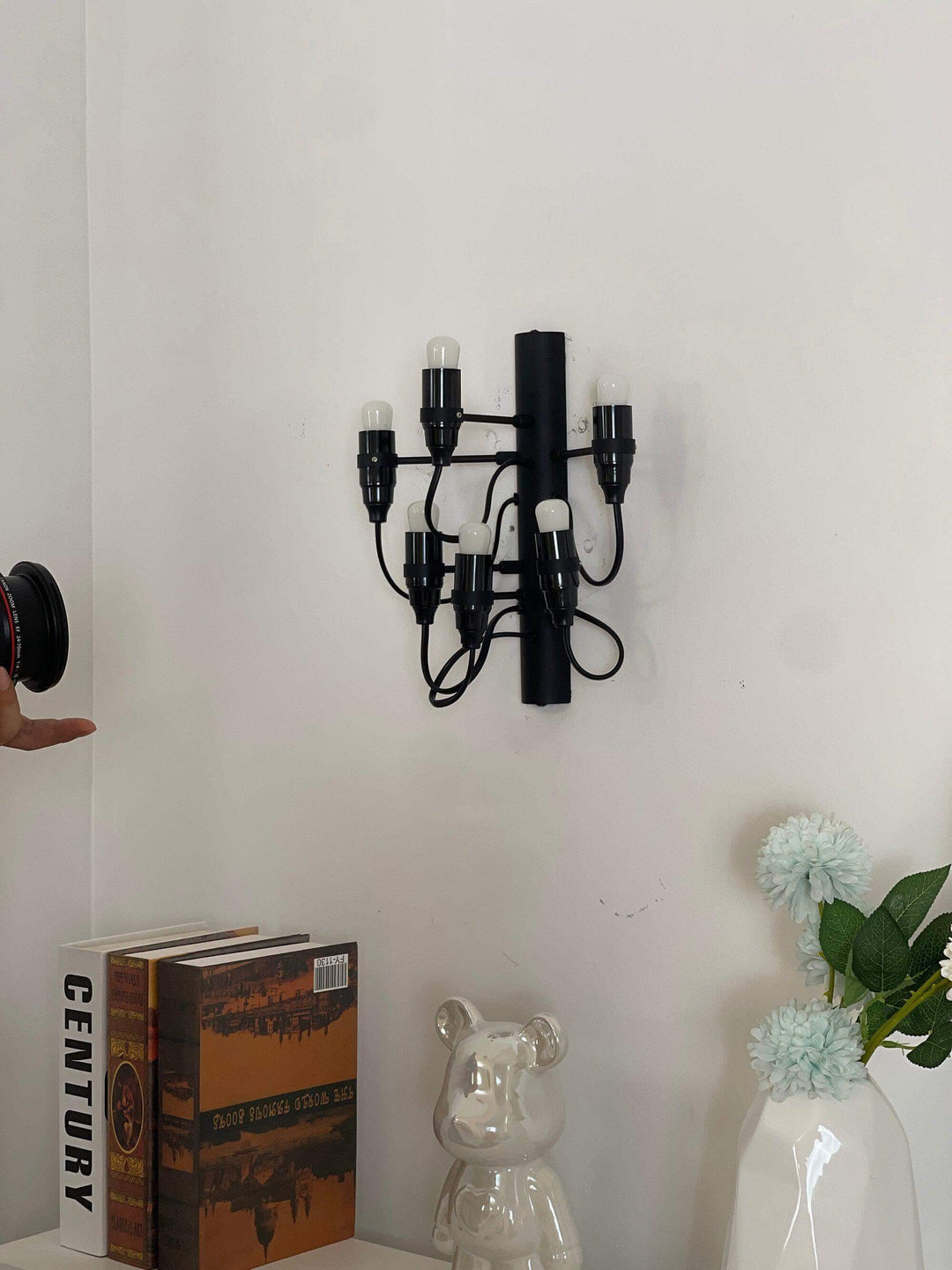 Classic 2097 mid century wall sconce with four heads, perfect for sitting or drawing room lighting.