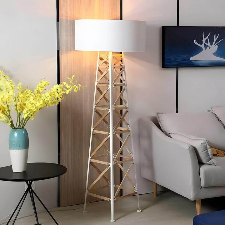Eiffel floor lamp in contemporary living room, metal and wood design, perfect for bedroom or modern decor.