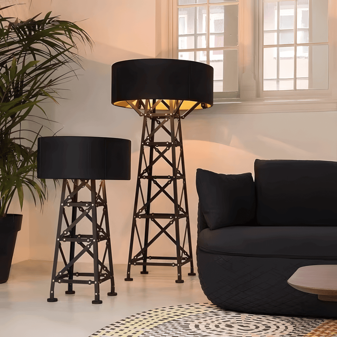 Eiffel Table Lamp, a modern unique table lamp, stylish bedside lamps in a contemporary living room with seating and plants.