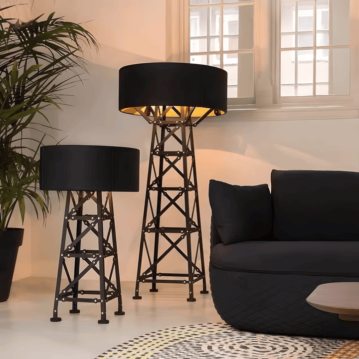 Eiffel Table Lamp, a modern unique table lamp, stylish bedside lamps in a contemporary living room with seating and plants.