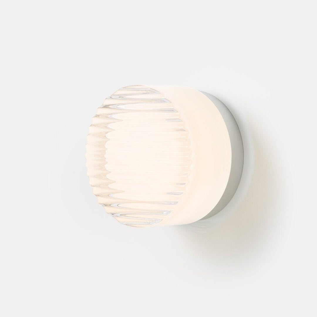 Crisp round vintage wall sconce, perfect small wall lighting for hallway with a modern design.