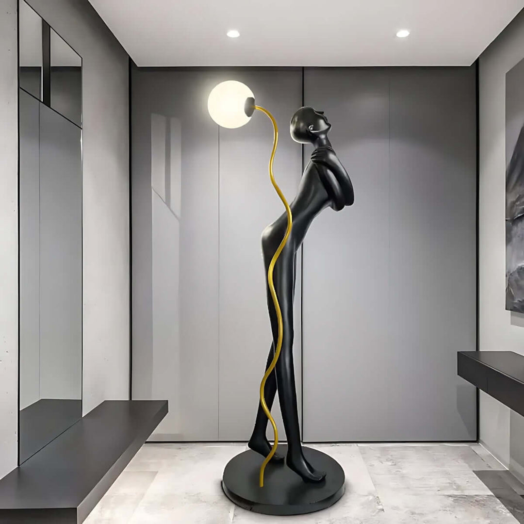 Sculptural floor lamp in art deco style, adding elegance to contemporary living room décor.