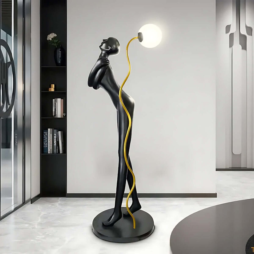 Sculptural Drayno Art Deco floor lamp for living room, featuring a stylish design with a unique figure and elegant lighting.