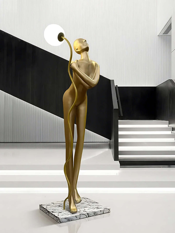 Sculptural art deco floor lamp, featuring a unique design and elegant light fixture, perfect for living room decor.
