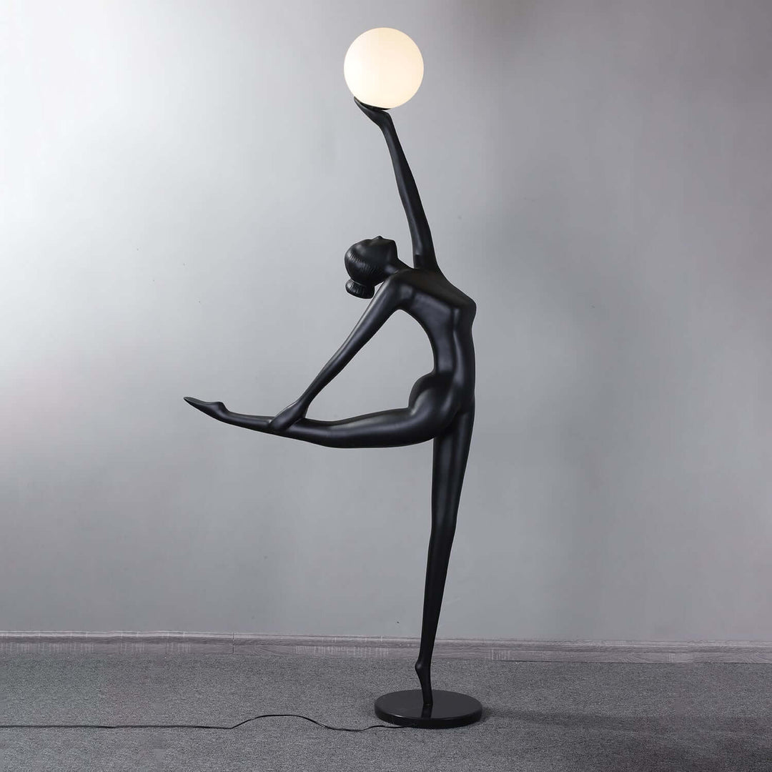 Elvani sculptural art deco floor lamp in black, perfect for modern living room lighting.
