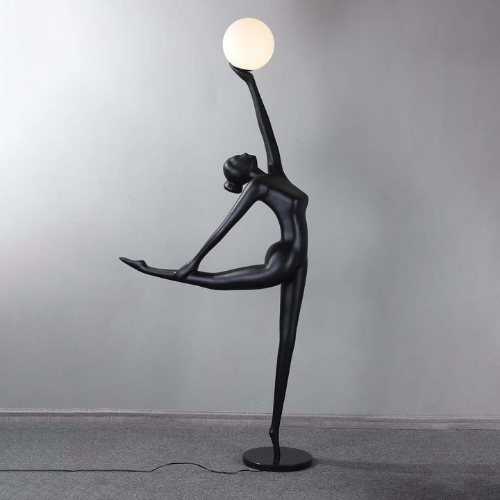 Elvani sculptural art deco floor lamp in black, perfect for modern living room lighting.