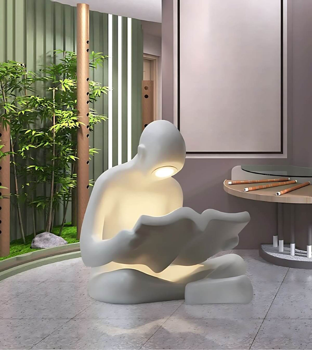 Elyvia sculptural floor lamp in modern living room, art deco design, illuminating with warm light, promoting reading ambiance.