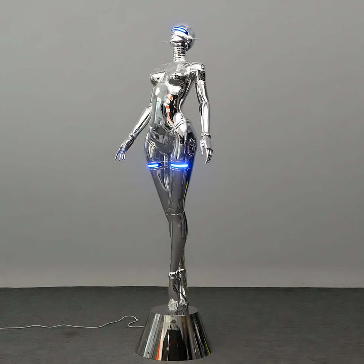 Sculptural Goddess Floor Lamp in silver, art deco design, perfect for trendy living room lighting.