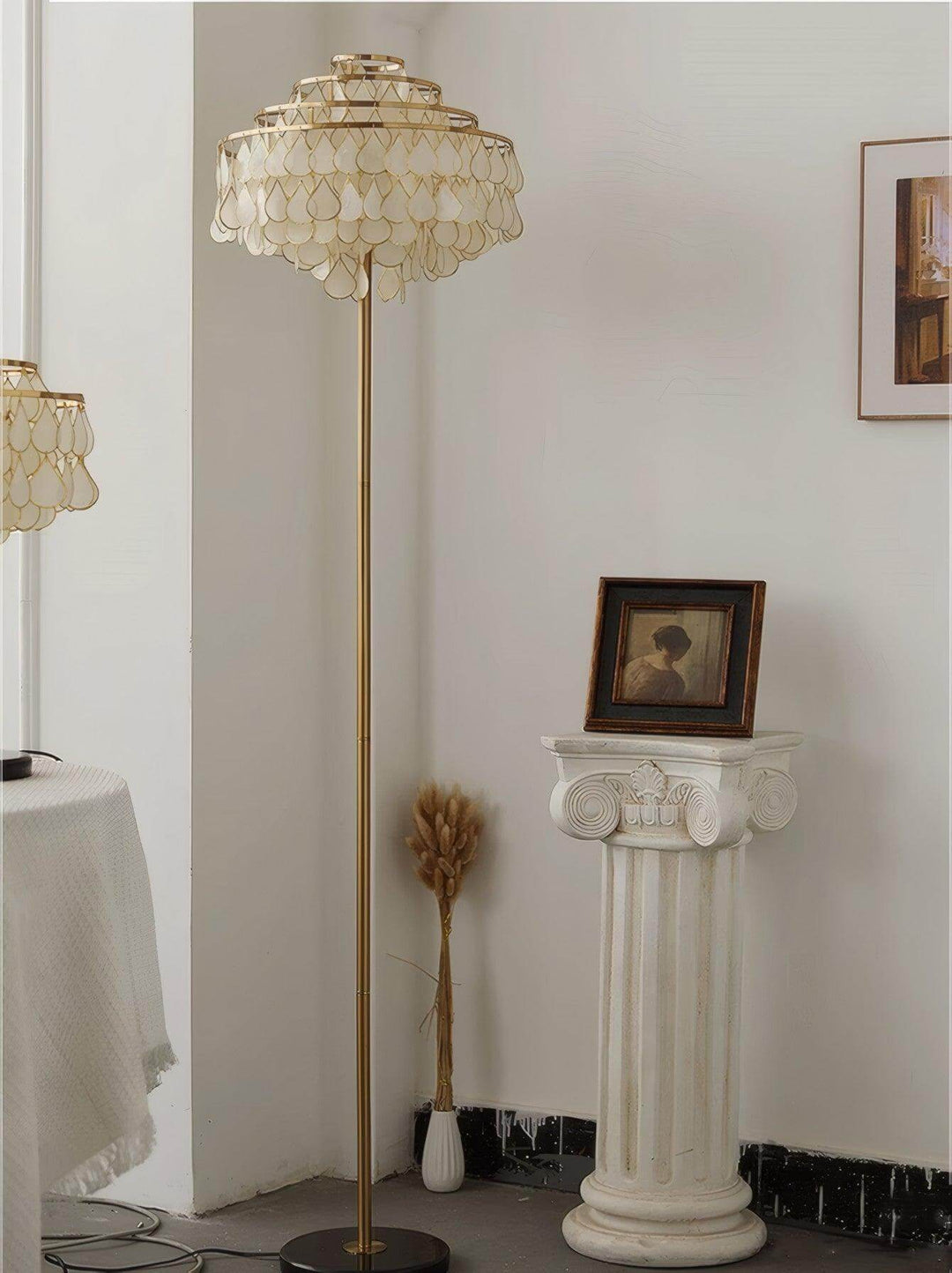 Teardrop shell floor lamp in a cozy room, stylish decorative floor lamp perfect for coastal-themed bedrooms.