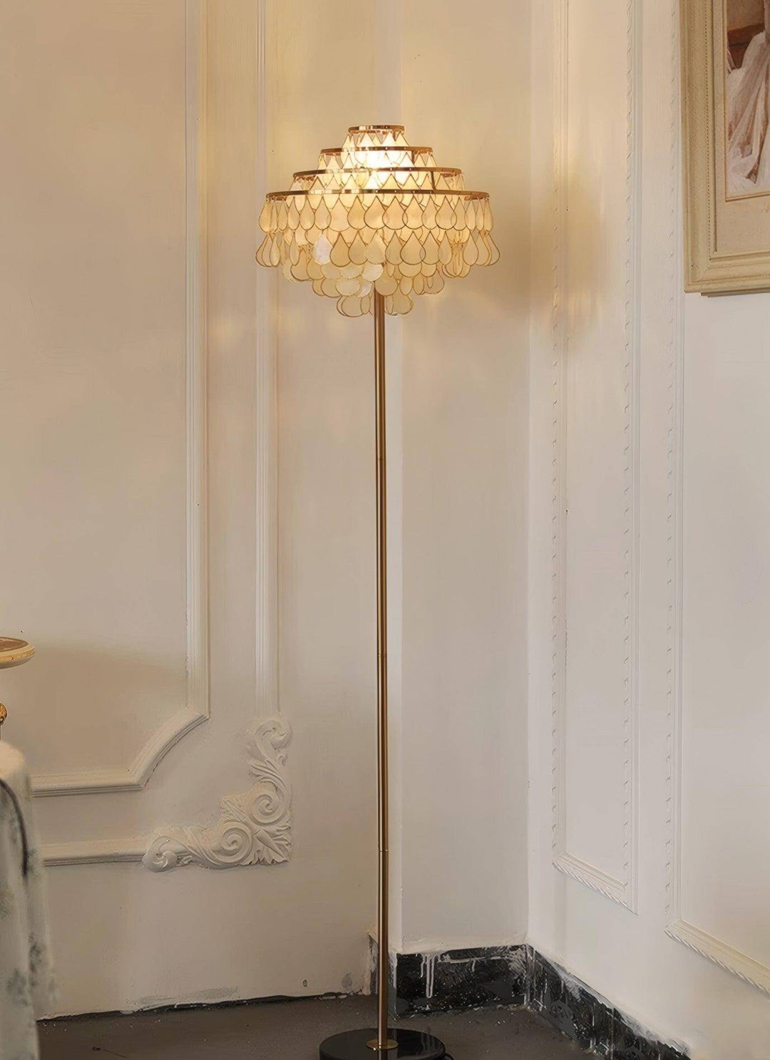 Teardrops Shell Floor Lamp in a cozy corner, featuring a coastal design perfect for bedroom lighting and décor.