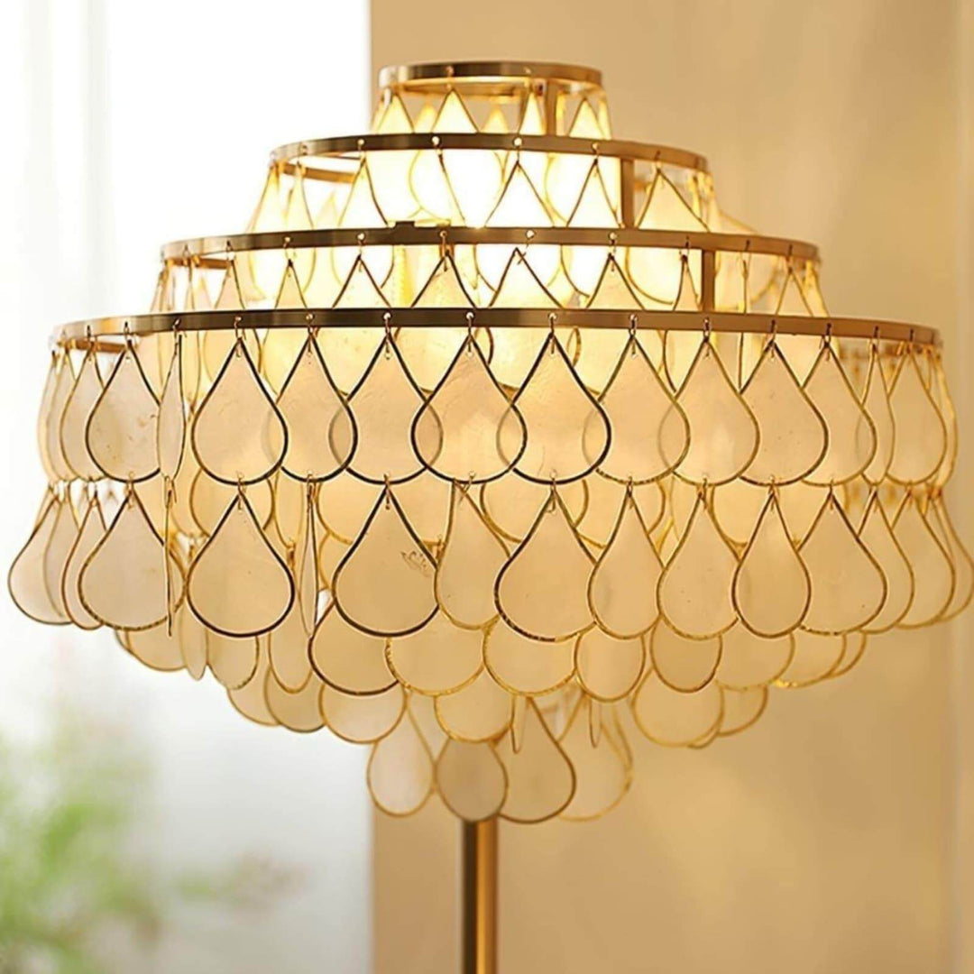 Coastal floor lamp with teardrop shell design, perfect decorative floor lamp for bedroom lighting.
