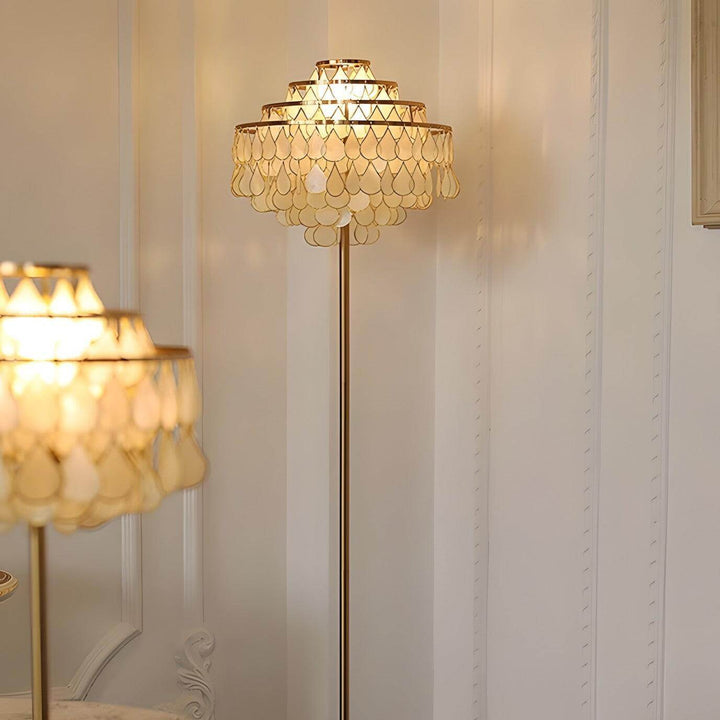 Teardrop shell floor lamp in gold, perfect as a coastal floor lamp or decorative floor light for bedroom ambiance.