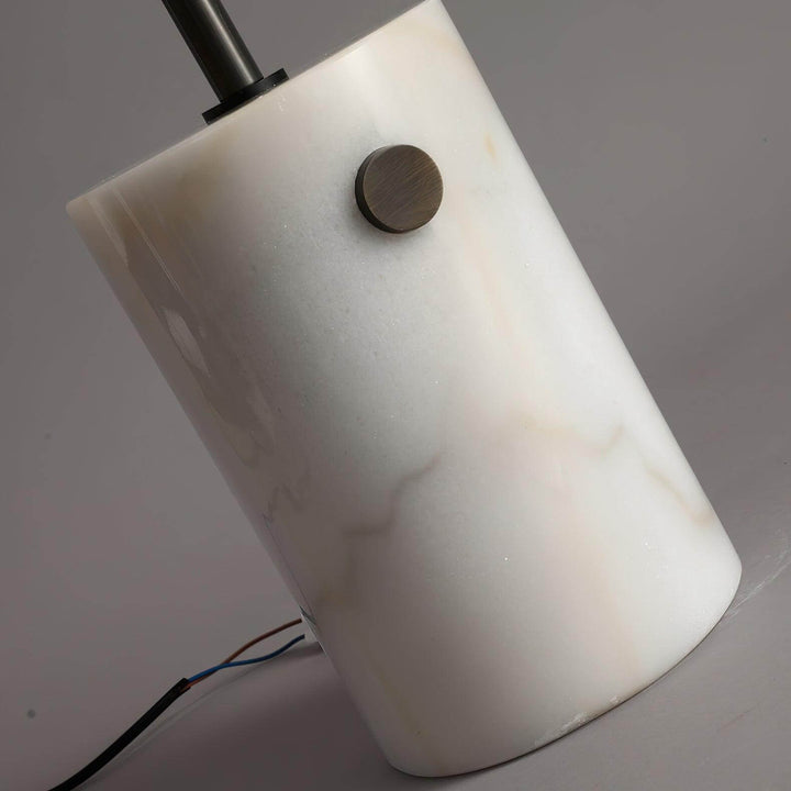 Close-up of JWDA Floor Lamp base featuring elegant marble design and minimalistic button for a modern touch.