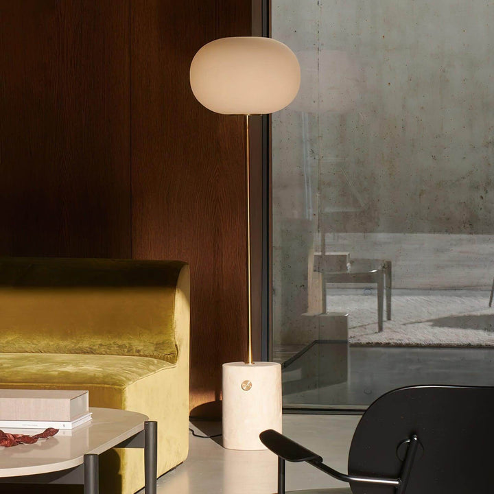 Modern JWDA floor lamp in a chic living room, featuring a unique design and stylish marble base, perfect as a reading lamp.