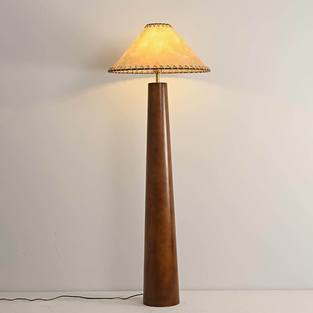 Kibo wooden floor lamp with a farmhouse style, perfect as a behind sofa lamp, featuring a soft-lit conical shade.