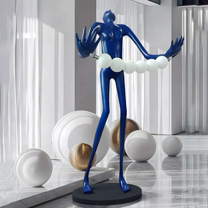 Sculptural art deco floor lamp in blue, designed for modern living room lighting, featuring bold artistic elements.