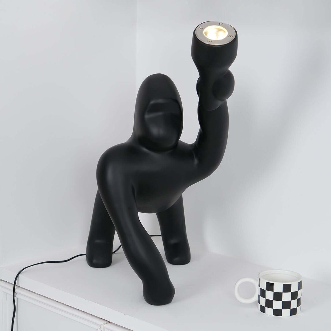 Kong sculpture floor lamp in black, a unique art deco floor lamp for stylish living room lighting.