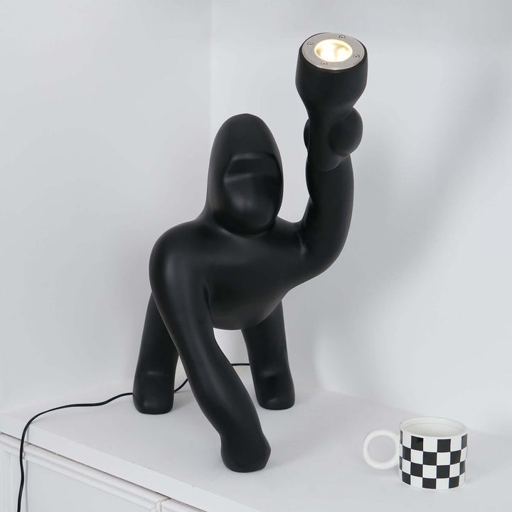 Kong sculpture floor lamp in black, a unique art deco floor lamp for stylish living room lighting.