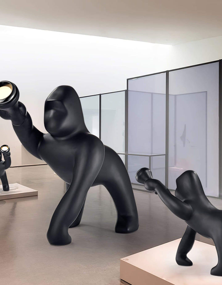 Sculptural floor lamp collection in a modern gallery, highlighting art deco style and unique design.