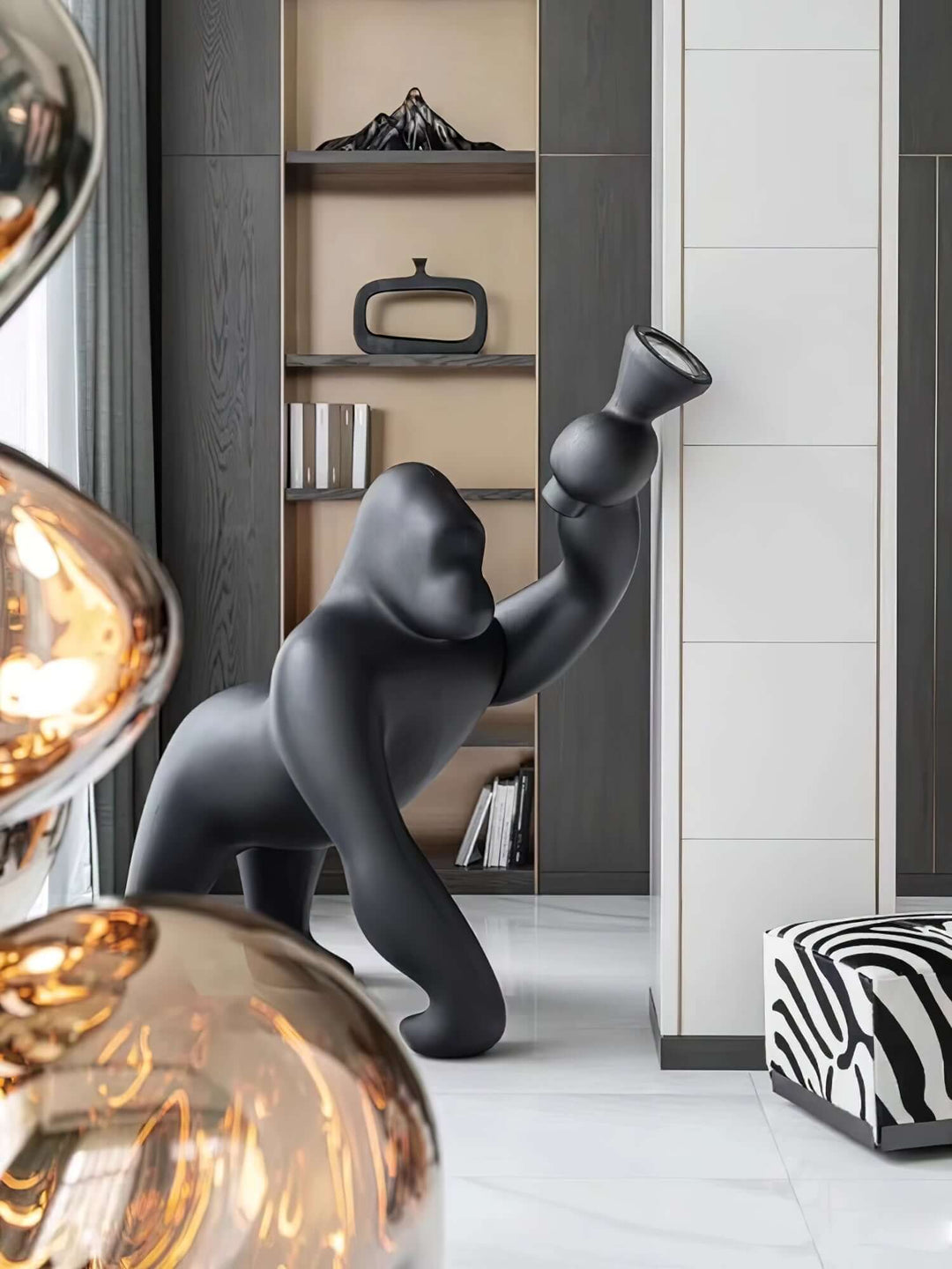 Kong sculpture floor lamp in modern interior, showcasing unique design and art deco style for living room lighting.