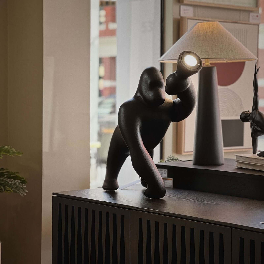 Kong sculpture floor lamp showcasing a unique design, perfect for modern art deco decor in living spaces.