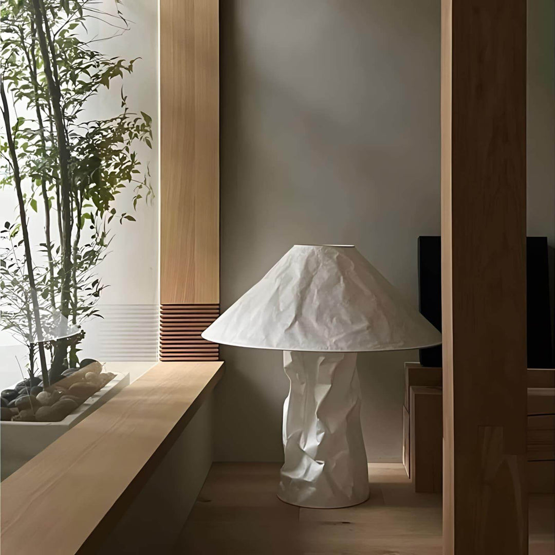 Stylish minimal table lamp in white, perfect for bedroom bedside decor, featuring a unique crumpled design.